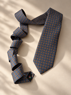 Windsor slate-blue medallion necktie showing the label on the back